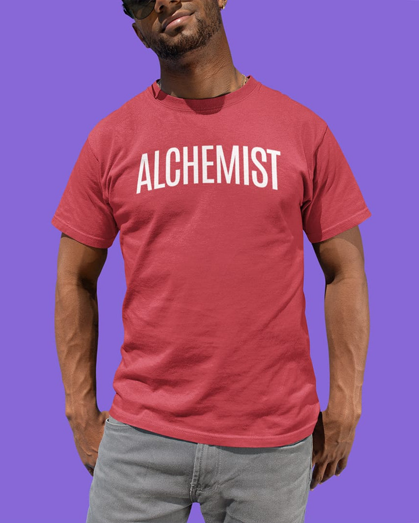 Man wearing Alchemist red t-shirt for transformation and personal alchemy.