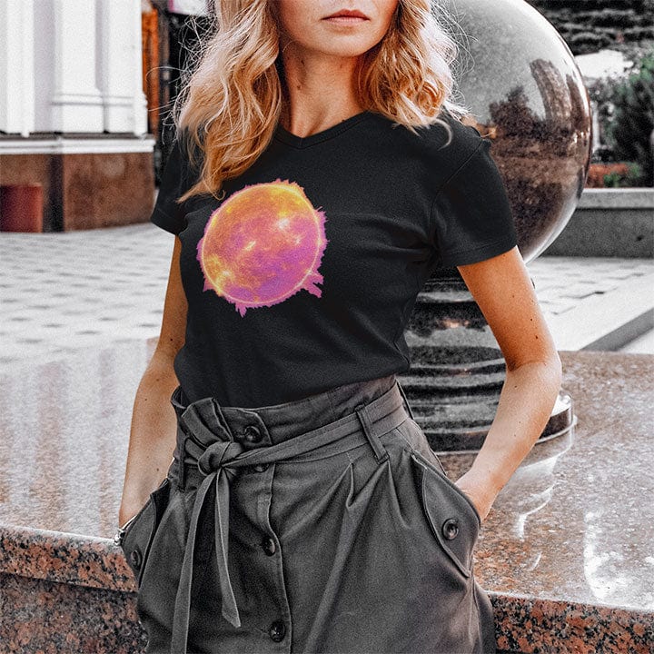 Woman wearing blazing sun in orange pink gold flames black t-shirt for intensity and passion.