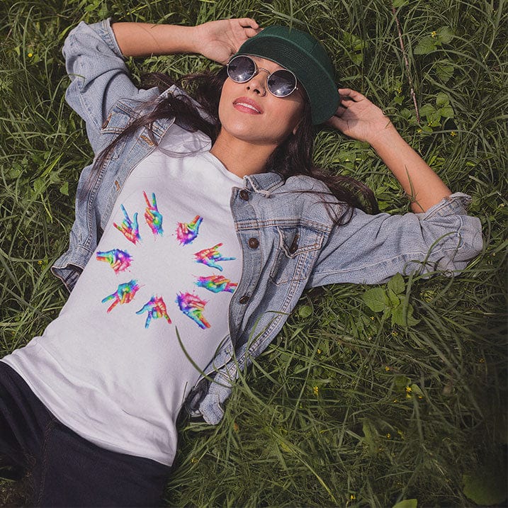 Woman wearing rainbow tie-dye hands arranged in circle white t-shirt for unity harmony peace community building spiritual connection inclusive love