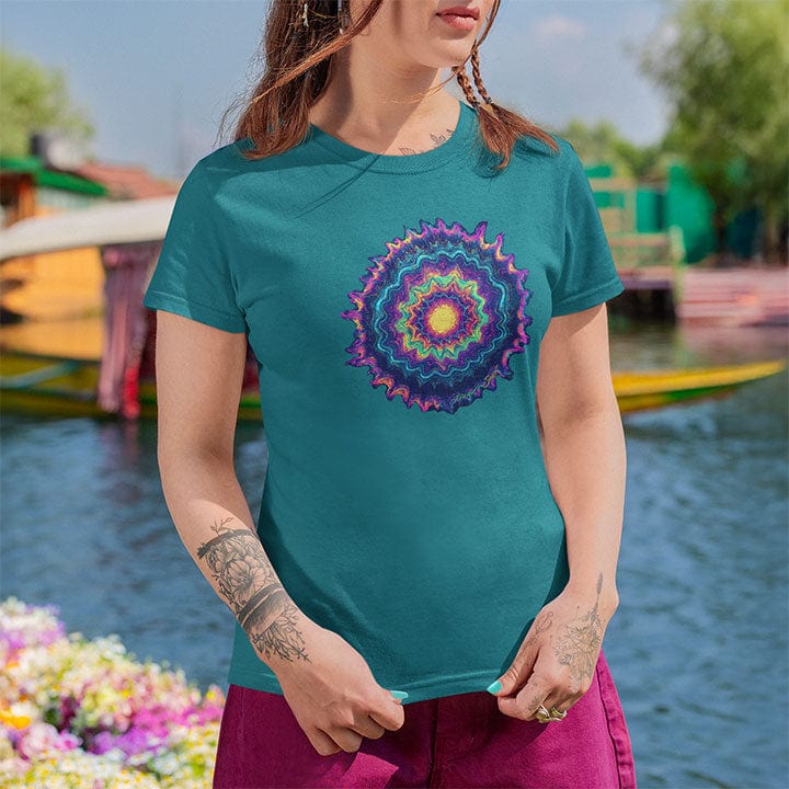 Woman wearing vibrant mandala rainbow tones turquoise t-shirt for color vibration frequency spiritual resonance pattern