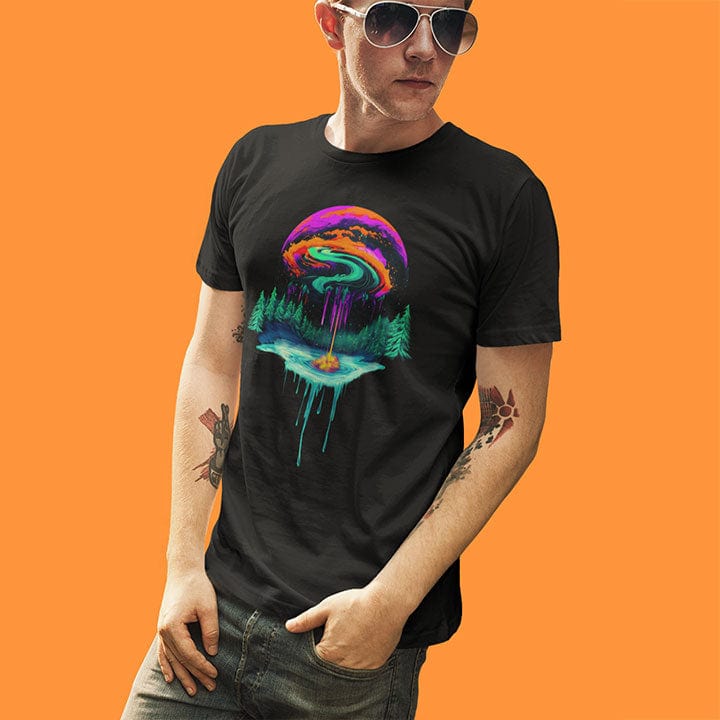 Man wearing floating water island with fire center evergreen trees and cosmic planet black t-shirt for elemental balance.