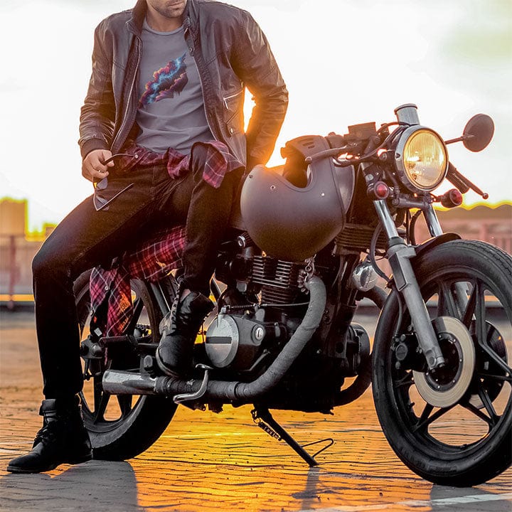 Man on a motorcycle wearing a cosmic form split between orange flame and icy blue on grey t-shirt for balance alchemy duality mastery spiritual transformation