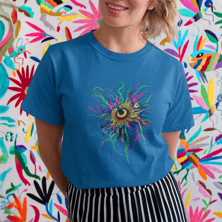 Woman wearing vibrant cosmic passion flower with radiating filaments and golden center blue t-shirt for passion blooming complexity beauty structure spiritual radiance