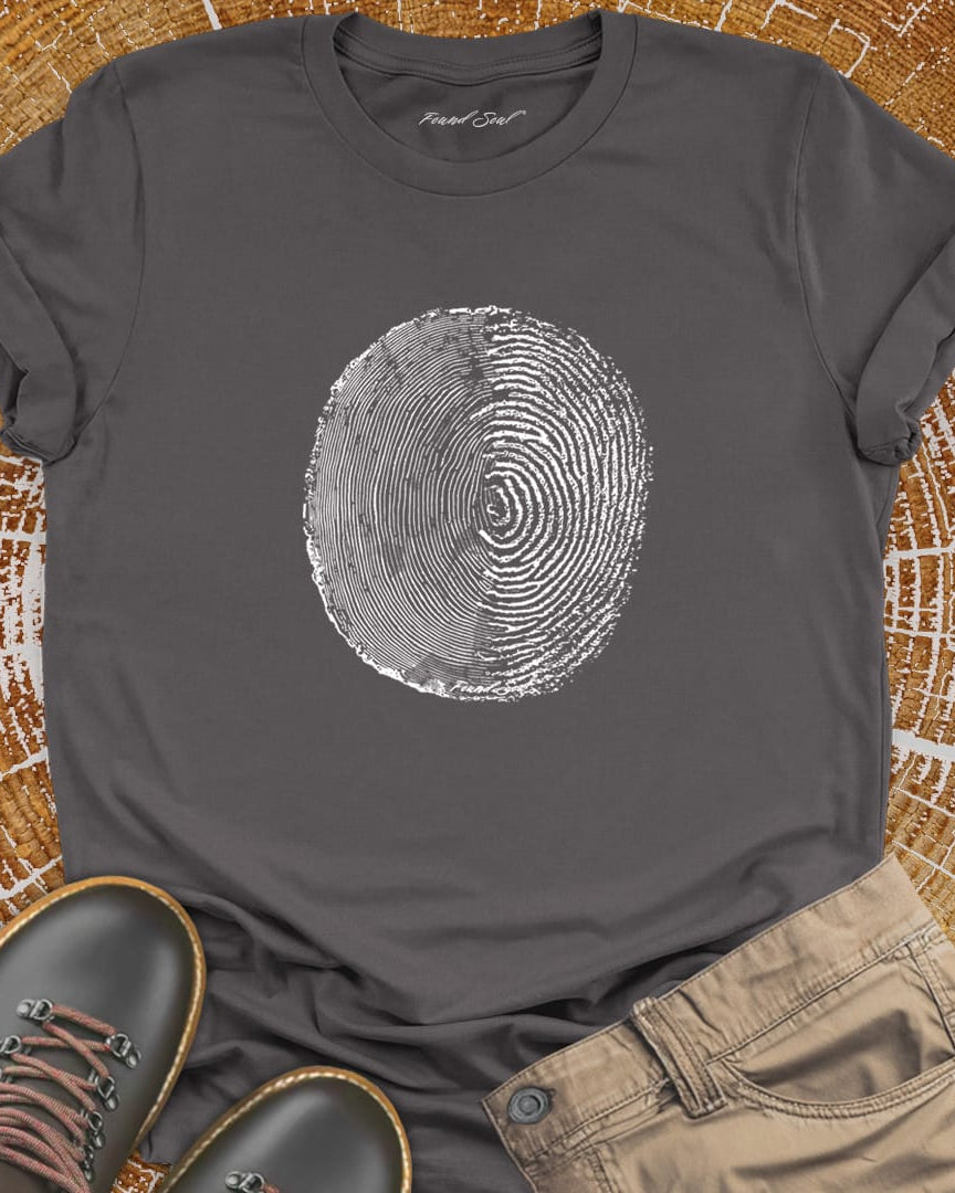 Tree ring and thumbprint design on grey t-shirt for nature identity growth layers
