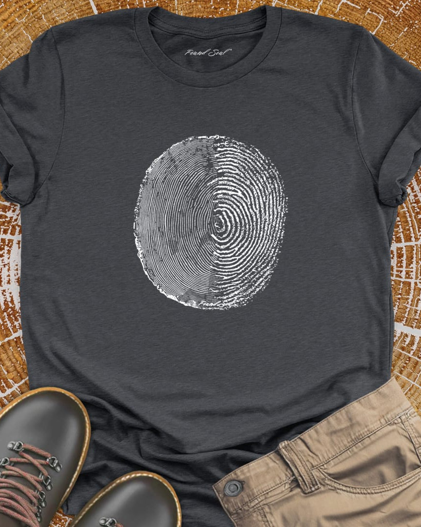 Tree ring and thumbprint design on grey t-shirt for nature identity growth layers
