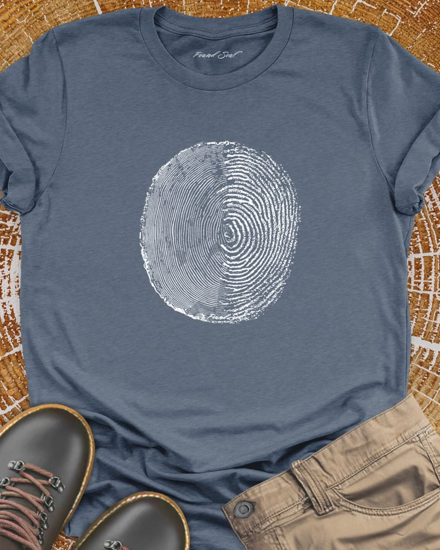 Tree ring and thumbprint design on grey t-shirt for nature identity growth layers