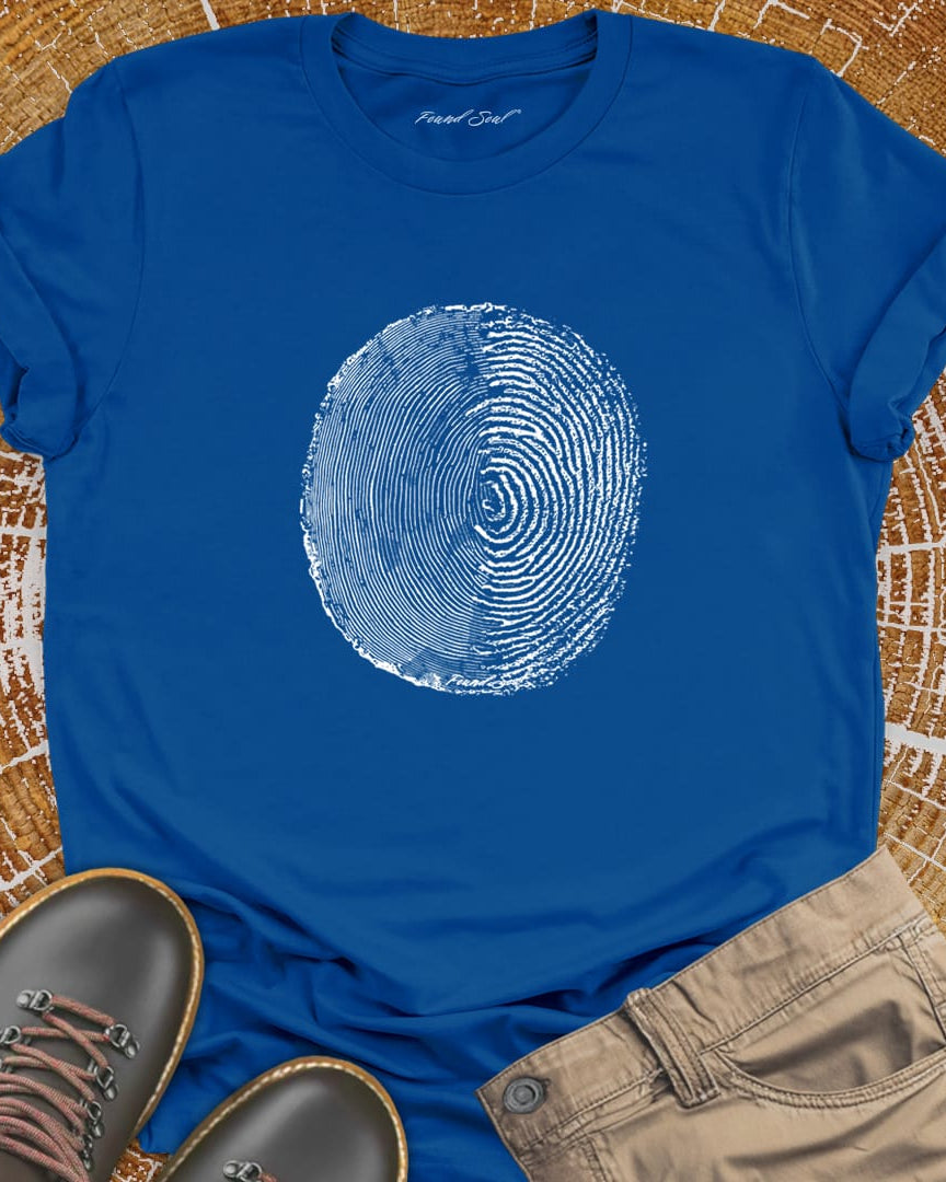 Tree ring and thumbprint design on buel t-shirt for nature identity growth layers