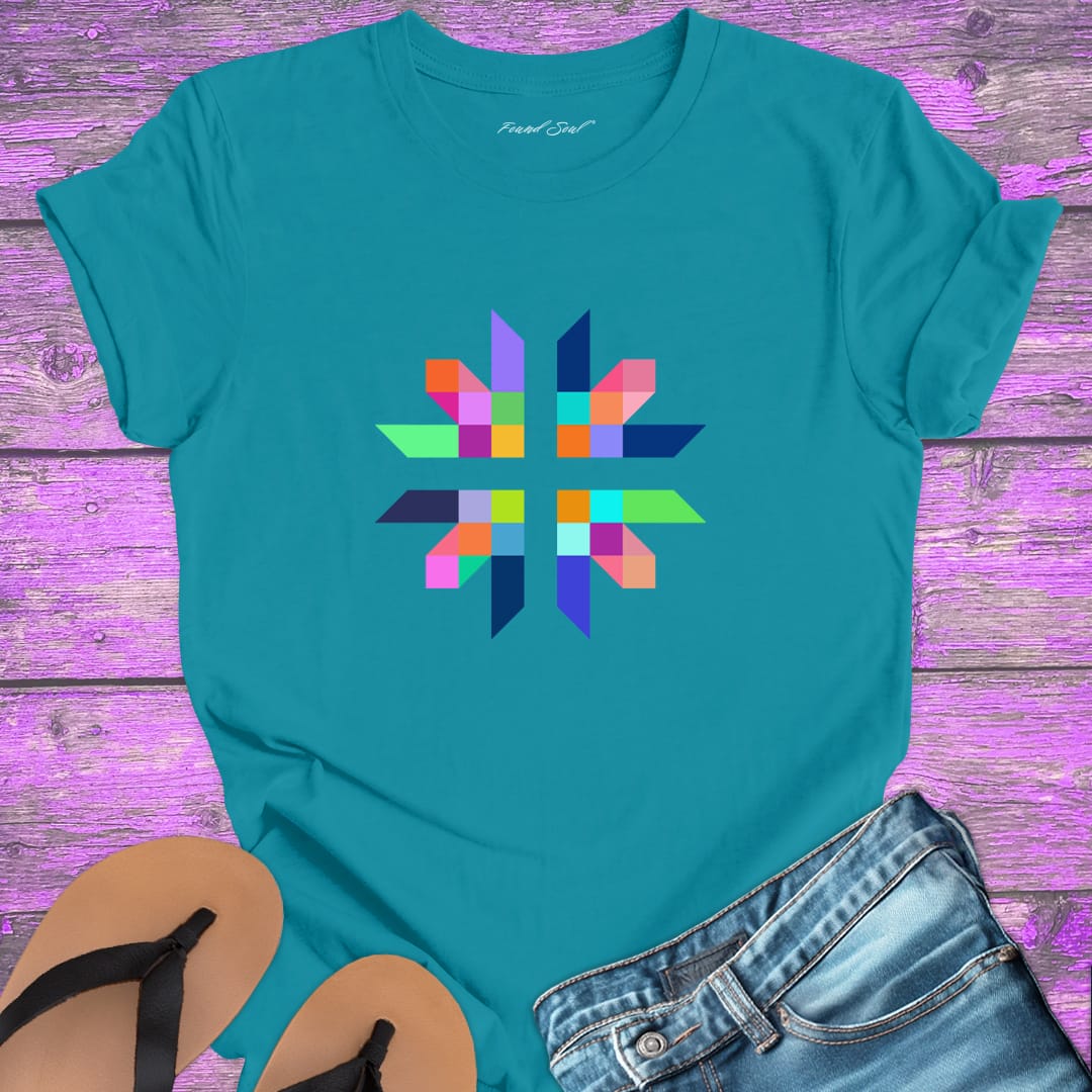 Intricate geometric star with intersecting pathways on turquoise t-shirt for sacred geometry alignment energetic flow