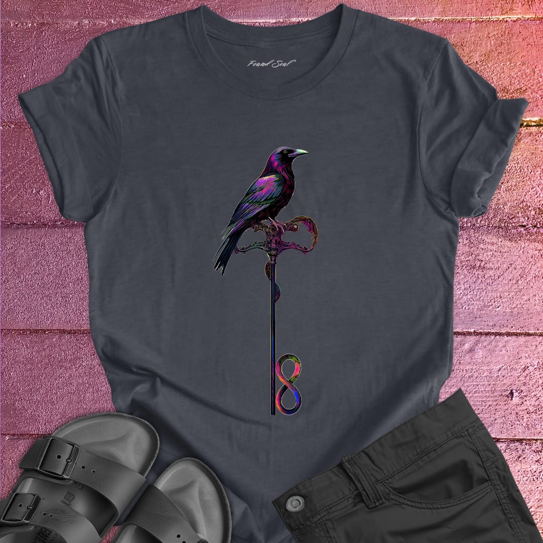 Vibrant bird perched on infinity symbol key on grey t-shirt for freedom access unlocking infinity spiritual liberation key