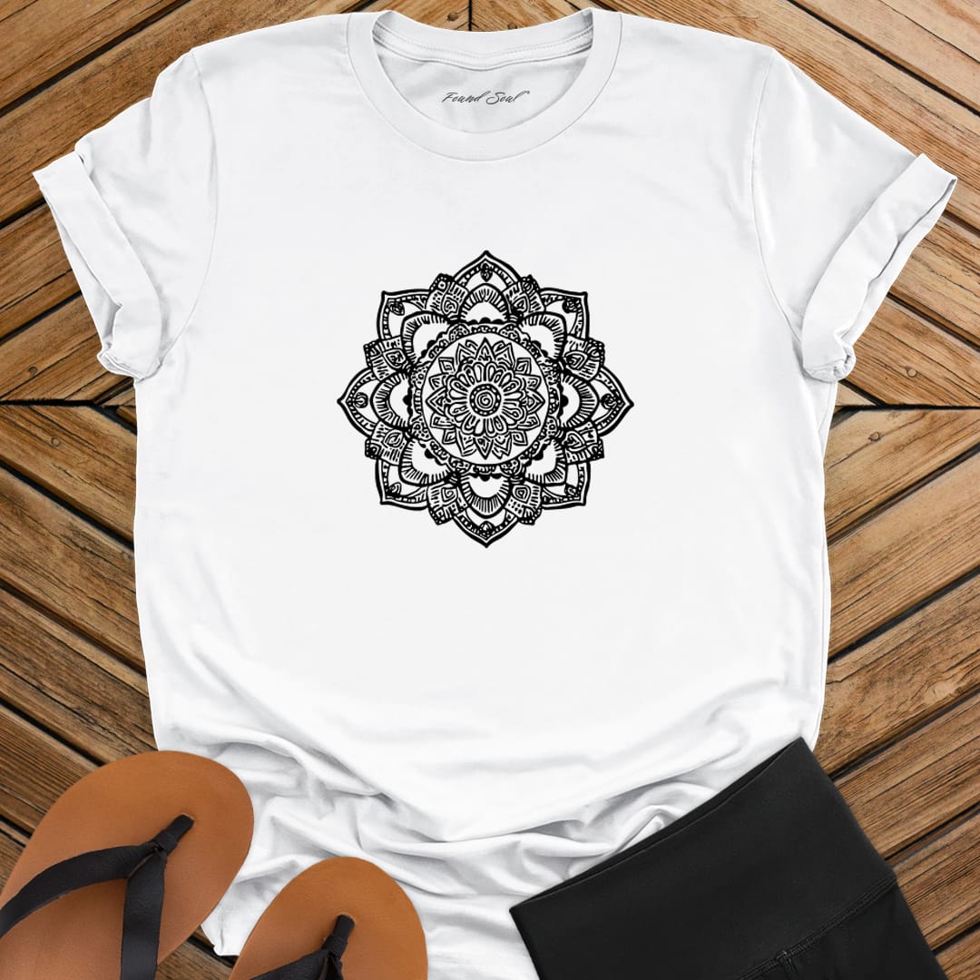 Intricate mandala with delicate line work on white t-shirt for zen meditation stillness sacred geometry detail awareness