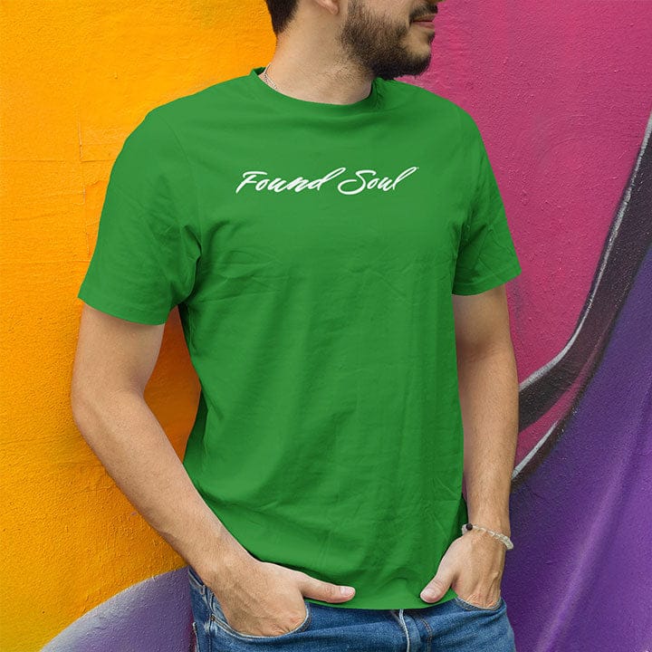 Man wearing Found Soul® dark to light green t-shirt for transformation and shadow work.