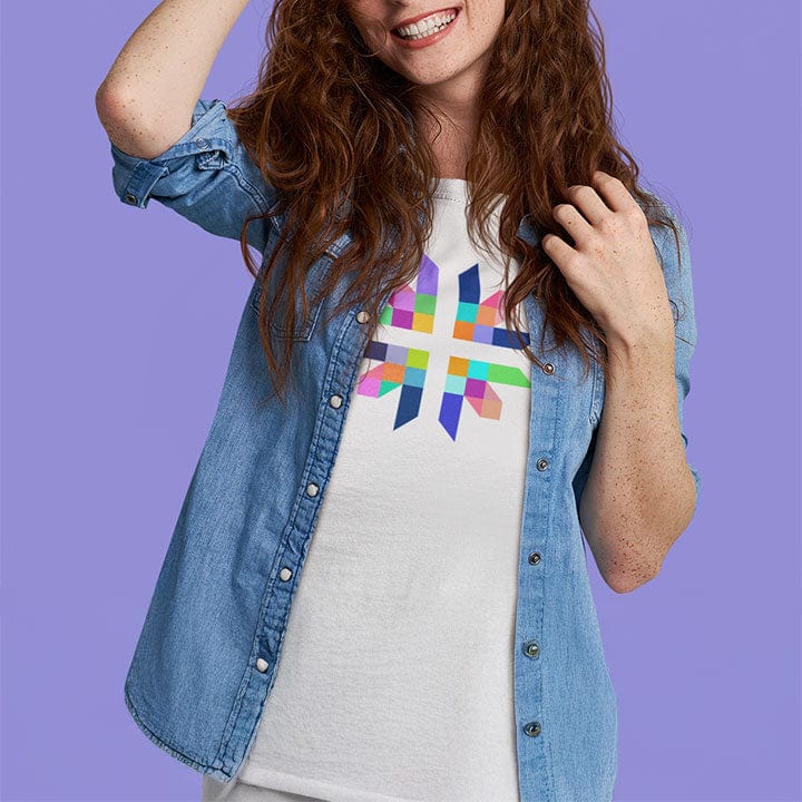 Woman wearing intricate geometric star with intersecting pathways on white t-shirt for sacred geometry alignment energetic flow