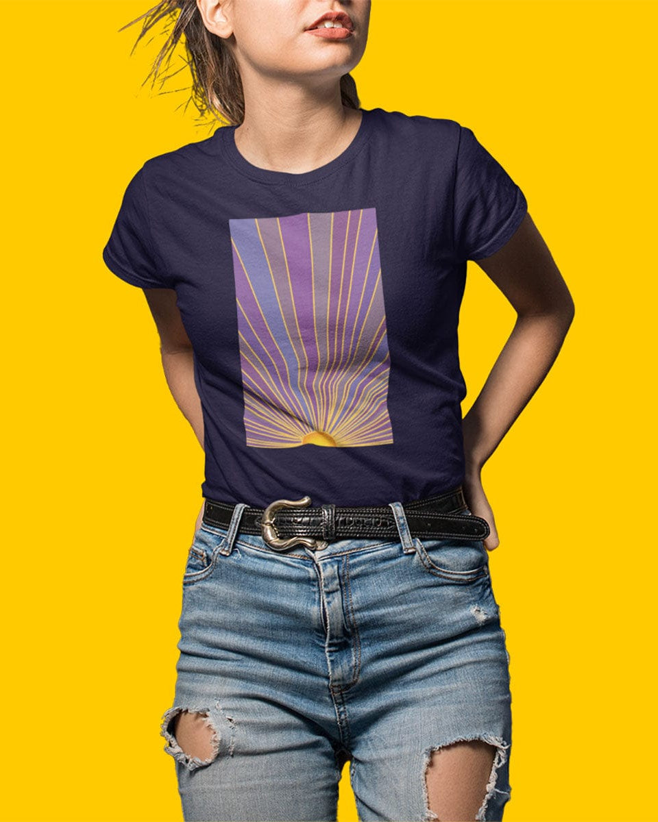 Woman wearing sunrise with radiating rays in purple and gold navy t-shirt for dawn watching infinite potential morning ritual
