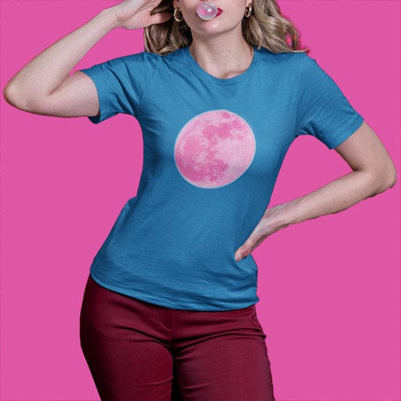 Woman wearing pink moon blue t-shirt for lunar cycles and moon gazers.