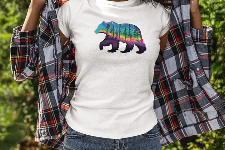 Woman wearing bear silhouette on white t-shirt for roaming wild movement sovereign soul nature freedom