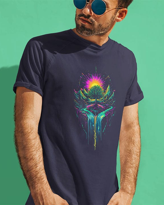 Man wearing cosmic tree of life with roots mountains and sunset navy t-shirt for grounding and expansion.