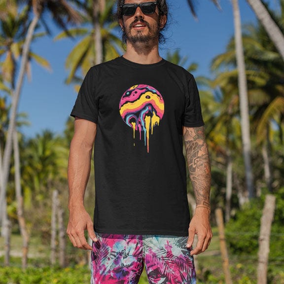 Man wearing dripping planet black t-shirt for nonconformity and creative rebellion.