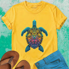 Sea turtle bold mosaic patterns yellow t-shirt for instinct and inner navigation.