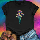 Luminous mushrooms rising from the soil black t-shirt for quiet power and natural radiance.