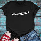 Black compassion t-shirt.