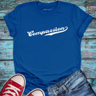Blue compassion t-shirt.