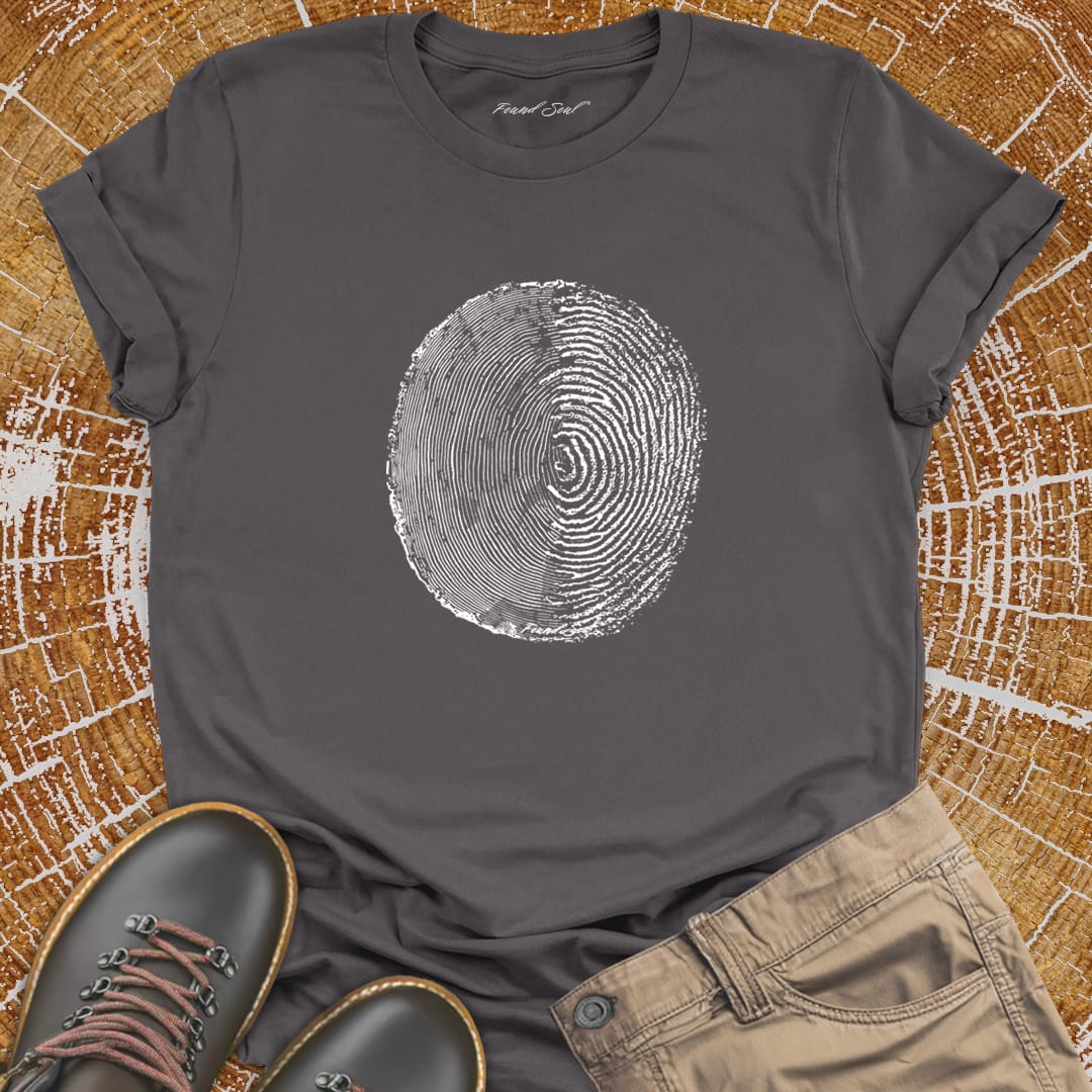 Tree ring and thumbprint design on grey t-shirt for nature identity growth layers