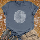 Tree ring and thumbprint design on grey t-shirt for nature identity growth layers