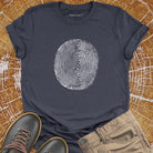 Tree ring and thumbprint design on grey t-shirt for nature identity growth layers