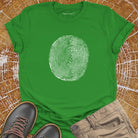 Tree ring and thumbprint design on green t-shirt for nature identity growth layers