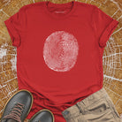 Tree ring and thumbprint design on red t-shirt for nature identity growth layers