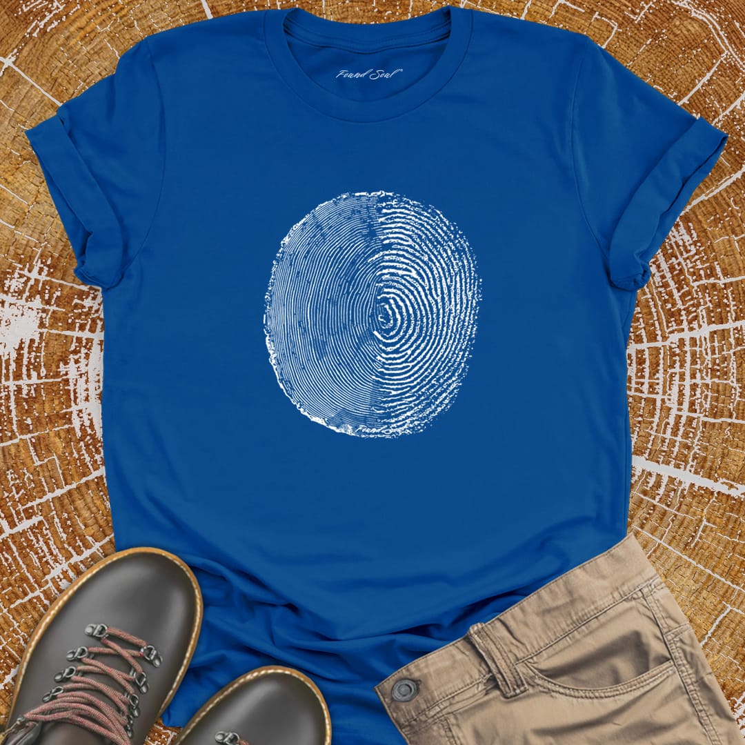 Tree ring and thumbprint design on buel t-shirt for nature identity growth layers