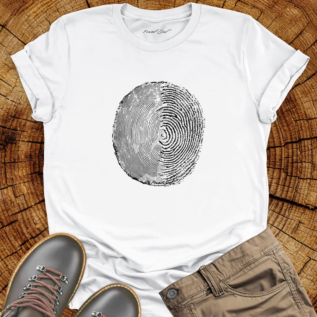 Tree ring and thumbprint design in white on white t-shirt for nature identity growth layers spiritual connection