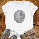 Tree ring and thumbprint design in white on white t-shirt for nature identity growth layers spiritual connection