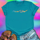 Found Soul® rainbow stars turquoise t-shirt for stardust and cosmic inheritance.