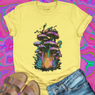 Iridescent purple green gold mushroom cluster with glowing mycelium yellow t-shirt.