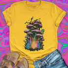 Iridescent purple green gold mushroom cluster with glowing mycelium yellow t-shirt.