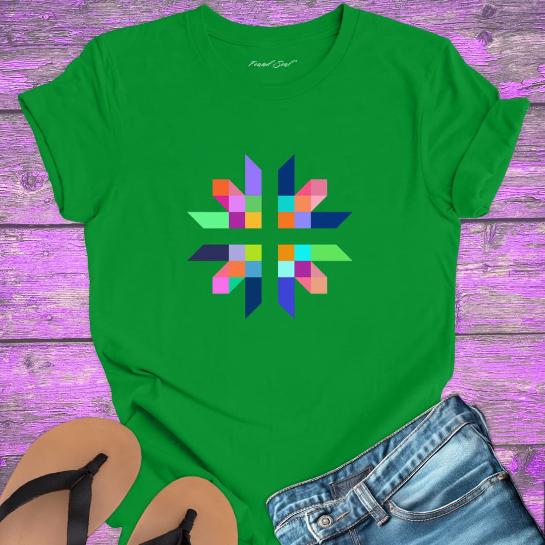 Intricate geometric star with intersecting pathways on green t-shirt for sacred geometry alignment energetic flow
