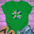 Intricate geometric star with intersecting pathways on green t-shirt for sacred geometry alignment energetic flow