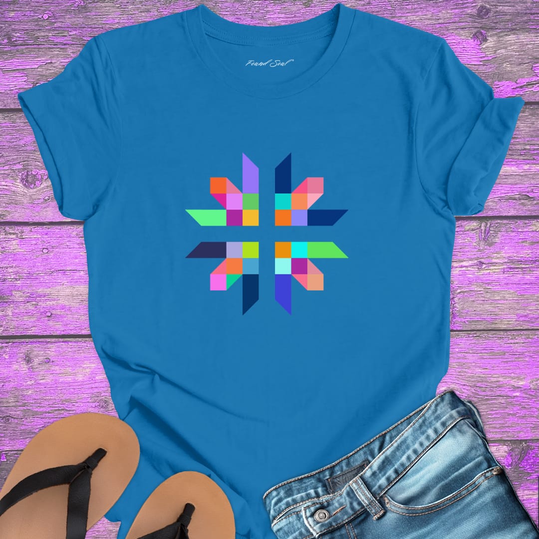 Intricate geometric star with intersecting pathways on blue t-shirt for sacred geometry alignment energetic flow