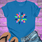 Intricate geometric star with intersecting pathways on blue t-shirt for sacred geometry alignment energetic flow