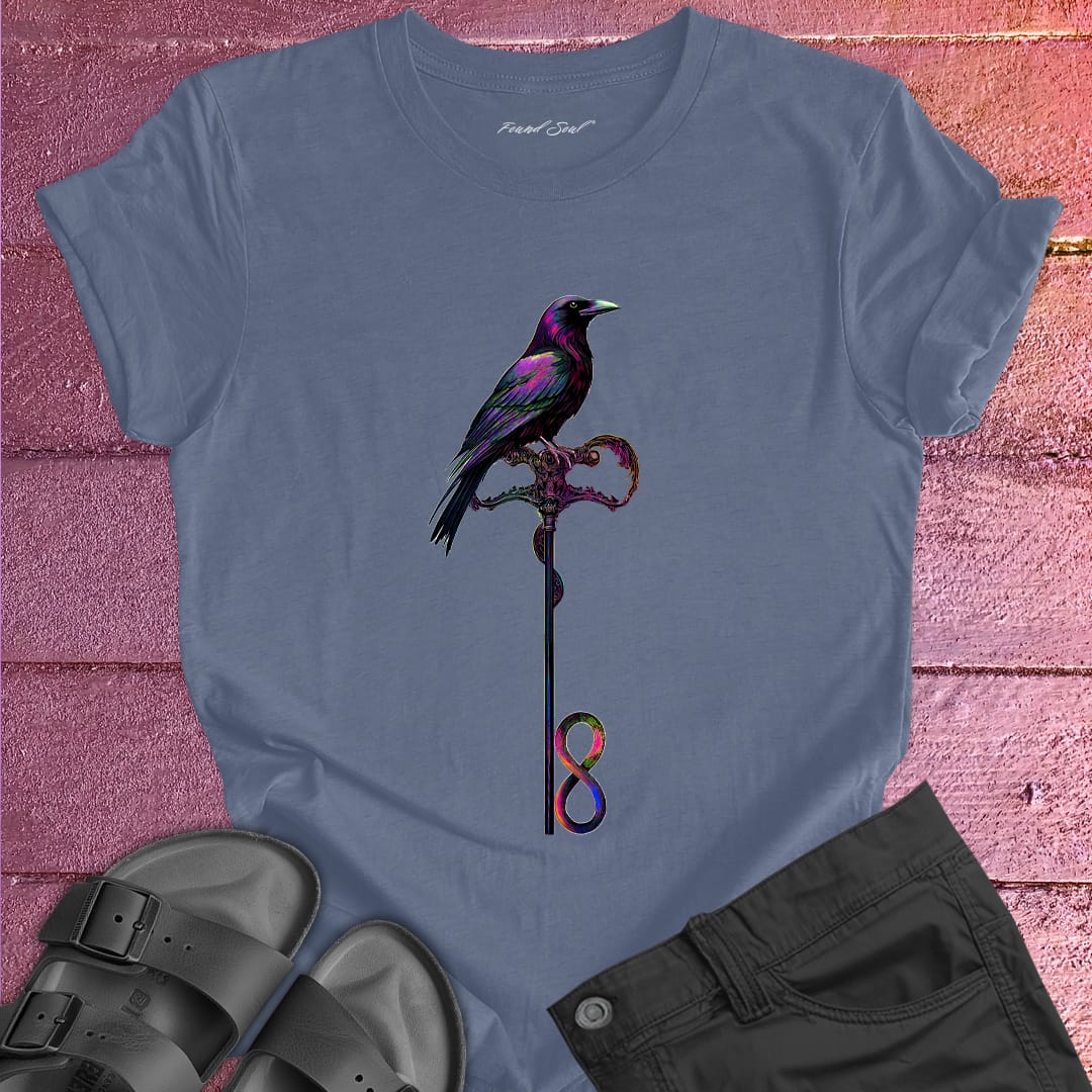 Vibrant bird perched on infinity symbol key on grey t-shirt for freedom access unlocking infinity spiritual liberation key