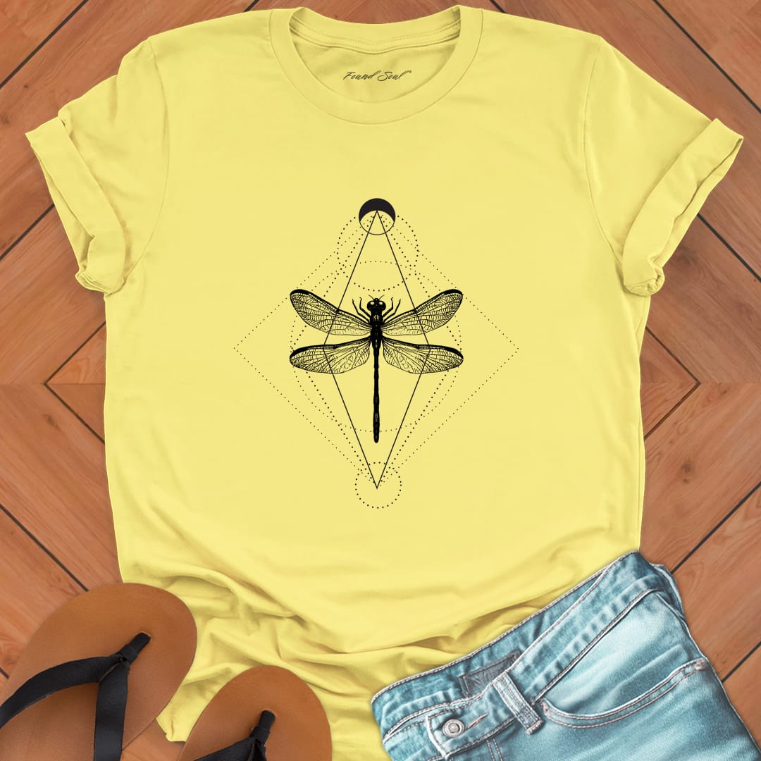 Minimalist geometric dragonfly with cosmic patterns on yellow t-shirt for transformation metamorphosis patient change spiritual growth
