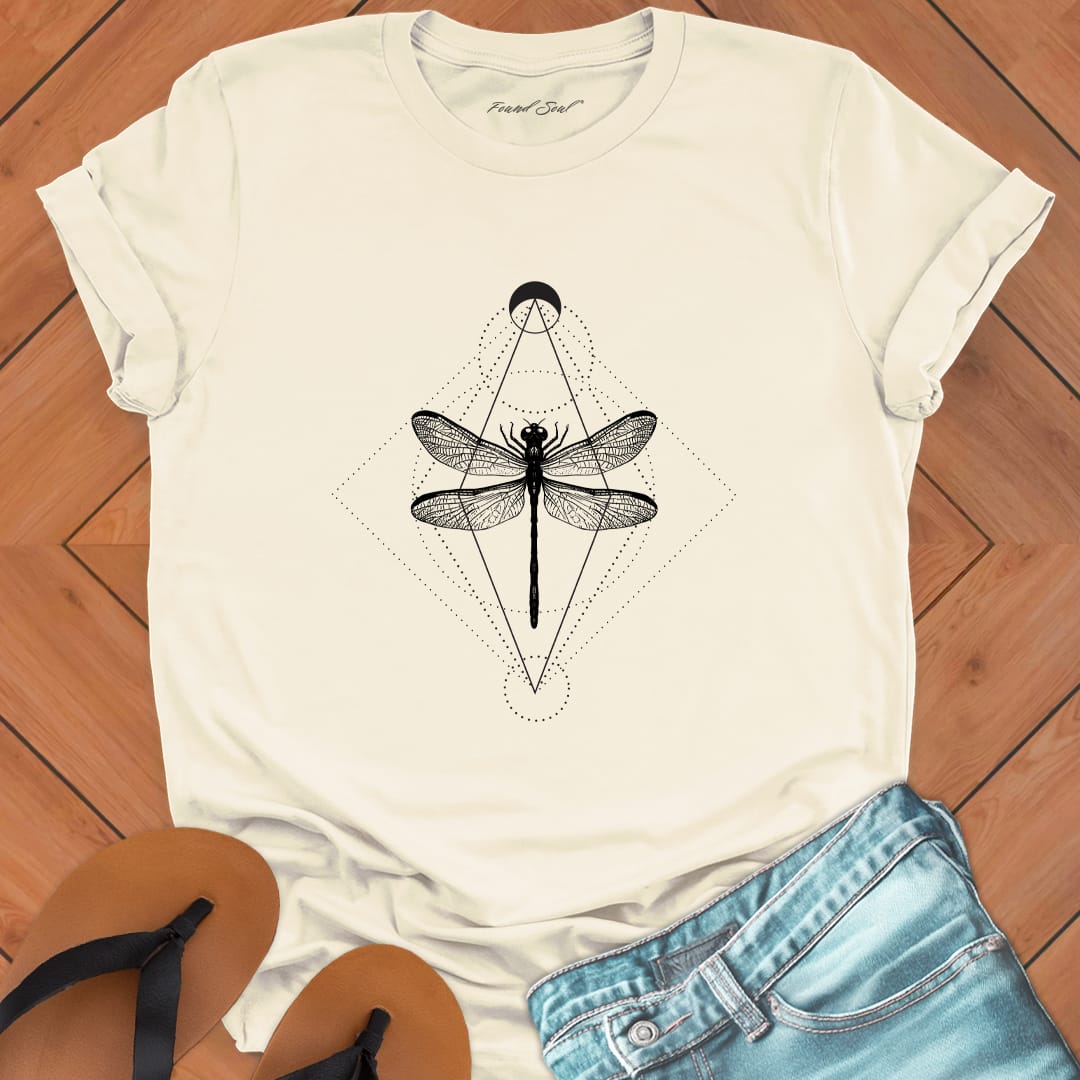 Minimalist geometric dragonfly with cosmic patterns on natural t-shirt for transformation metamorphosis patient change spiritual growth