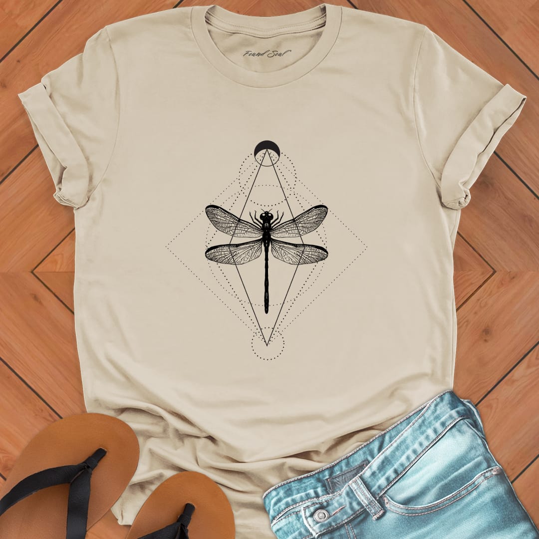 Minimalist geometric dragonfly with cosmic patterns on sand t-shirt for transformation metamorphosis patient change spiritual growth