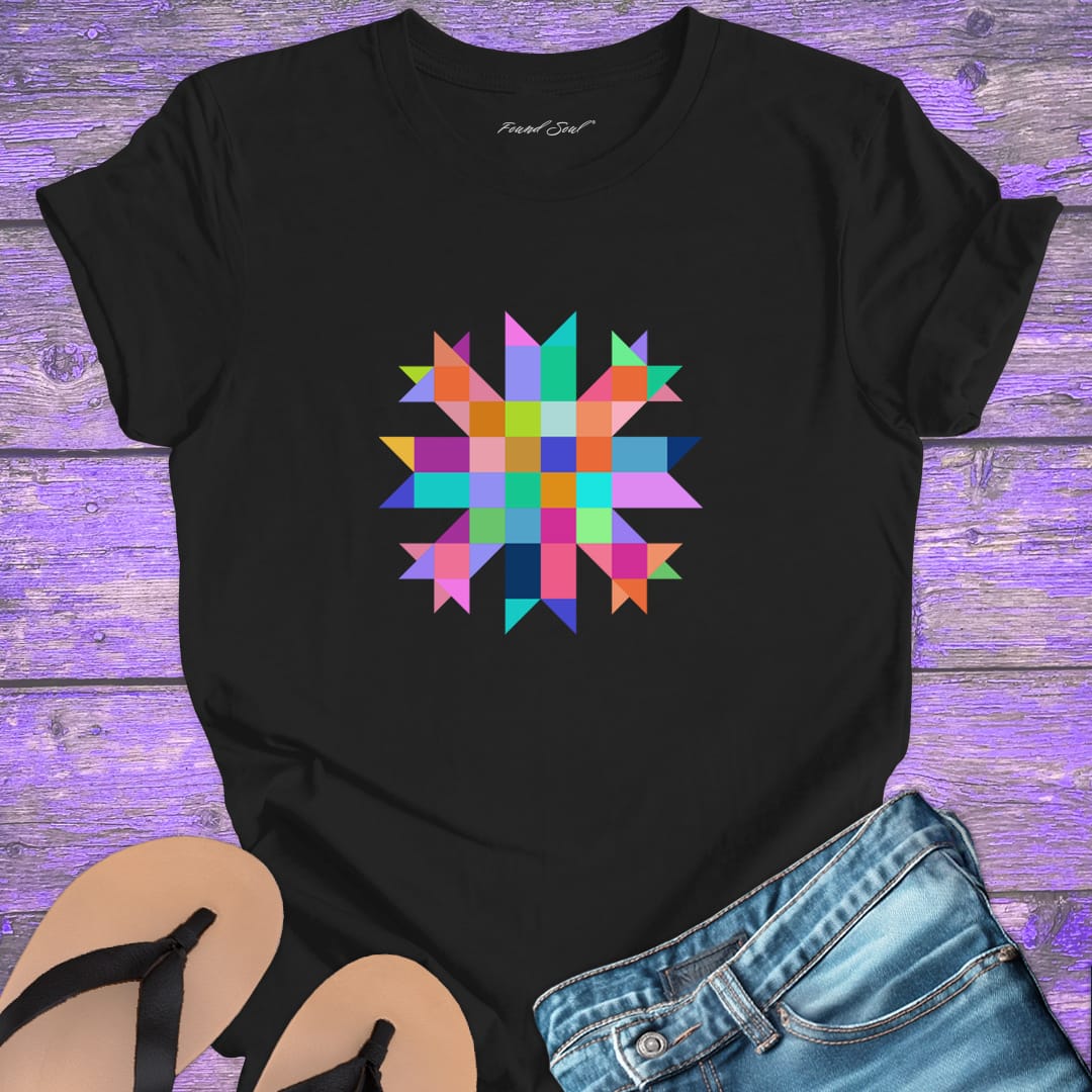 Vibrant mosaic geometric star with colorful angular pieces on  black t-shirt for healing wholeness transformation sacred geometry