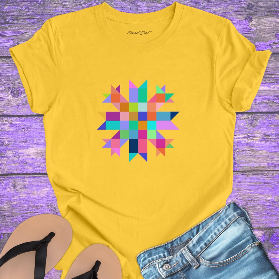 Vibrant mosaic geometric star with colorful angular pieces on yellow t-shirt for healing wholeness transformation sacred geometry
