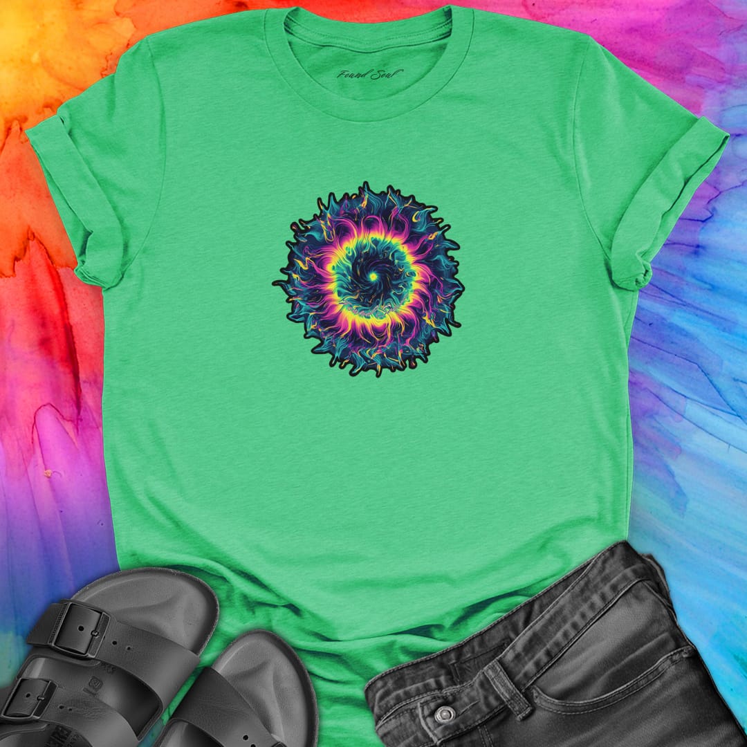 Vibrant rainbow and black spiral mandala on green t-shirt for energy frequency.