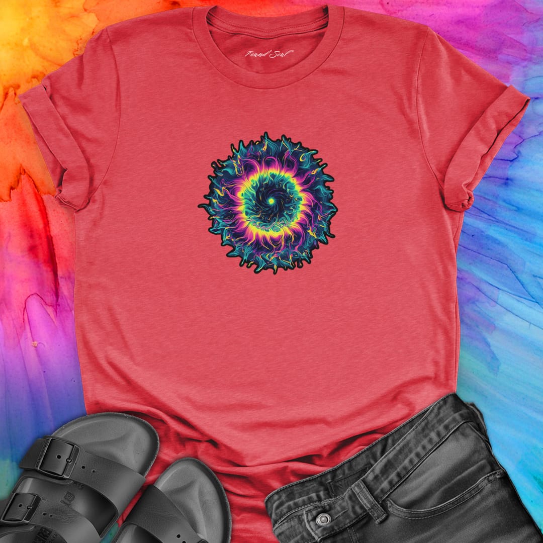 Vibrant rainbow and black spiral mandala on red t-shirt for energy frequency.