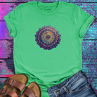 Vibrant layered mandala radiating outward in warm sunset tones green t-shirt for energy radiation core pulse spiritual generation