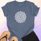 Mandala with delicate petal symmetry on grey t-shirt for meditation consciousness expansion sacred geometry